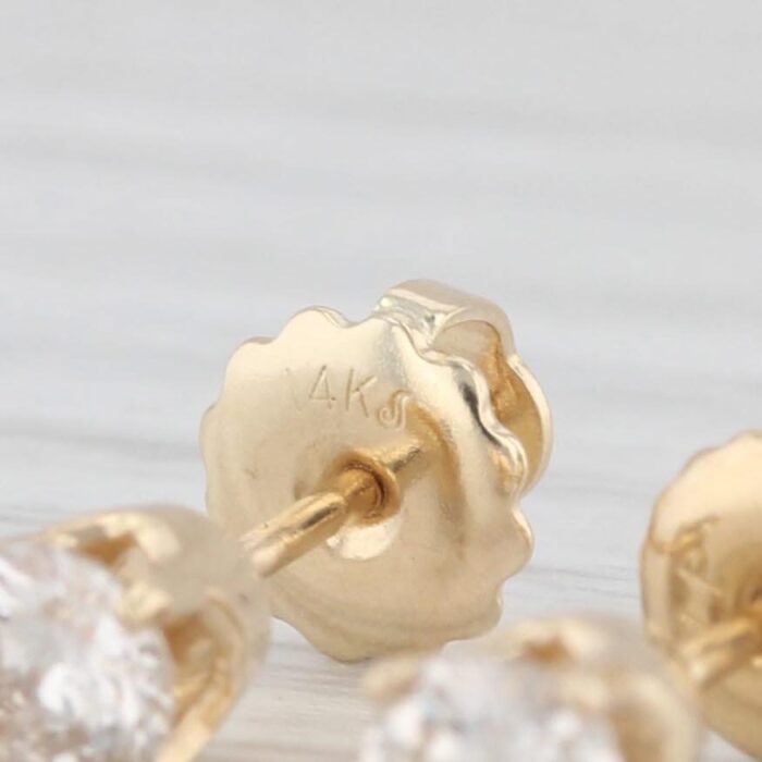 046ctw diamond stud earrings 14k yellow gold round solitaire studs 2 pieces 7117 scaled