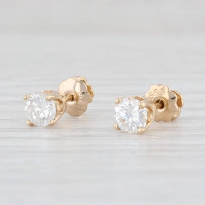 050ctw diamond round solitaire stud earrings 14k yellow gold pierced studs 2 pieces 9394