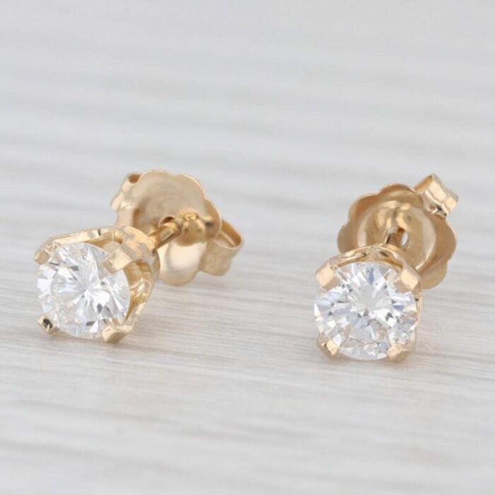 050ctw round diamond solitaire stud earrings 14k yellow gold 2 pieces 2110