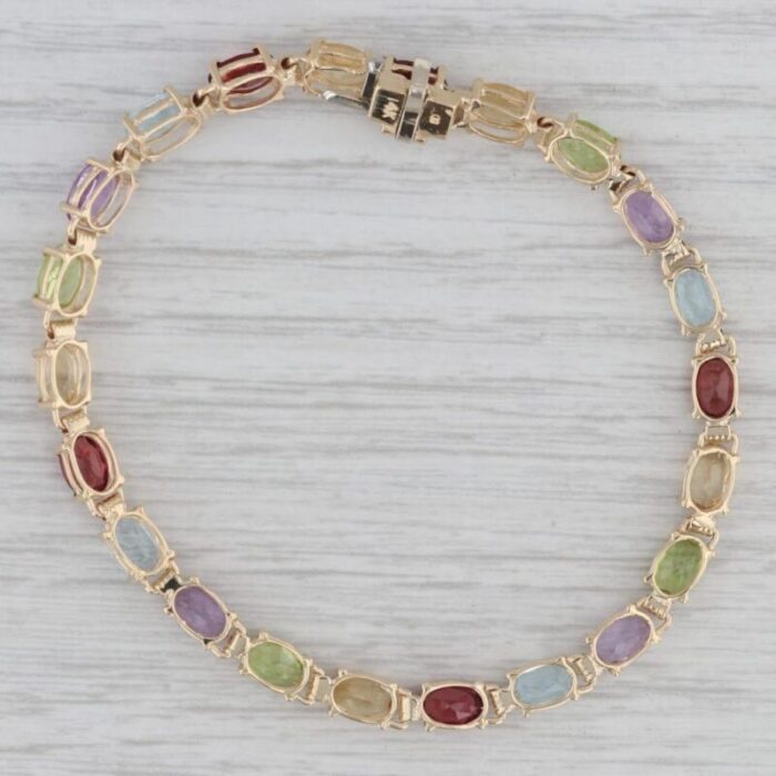 1118ctw multi gemstone tennis bracelet 14k gold 7 garnet topaz citrine peridot 6955