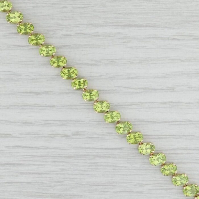 2240ctw peridot tennis bracelet 14k yellow gold 725 73mm 0374