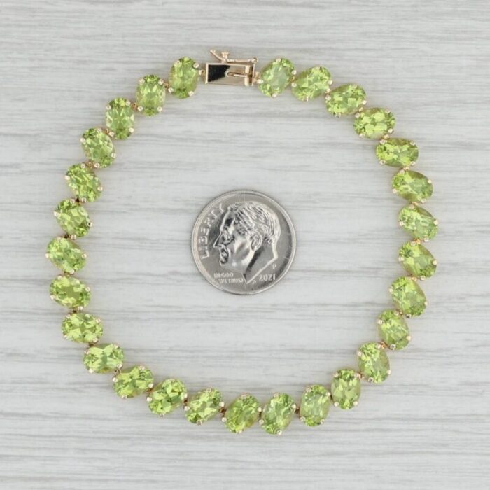 2240ctw peridot tennis bracelet 14k yellow gold 725 73mm 3432