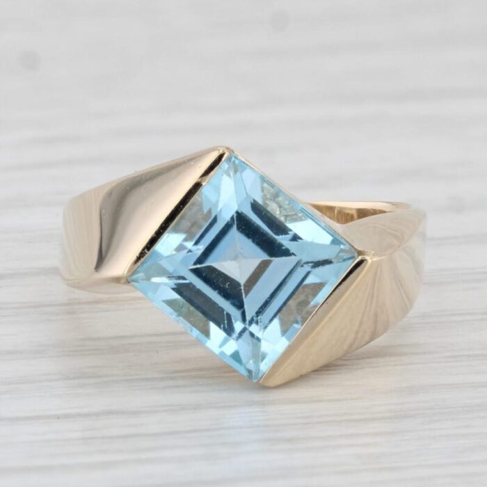 4ct blue topaz ring 14k yellow gold size 825 bypass princess solitaire 0271