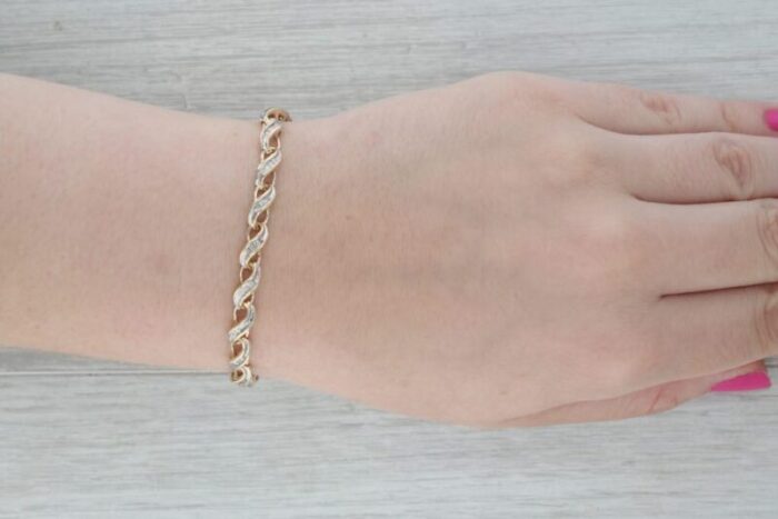 7 diamond scalloped linked bracelet 10k yellow gold 7618