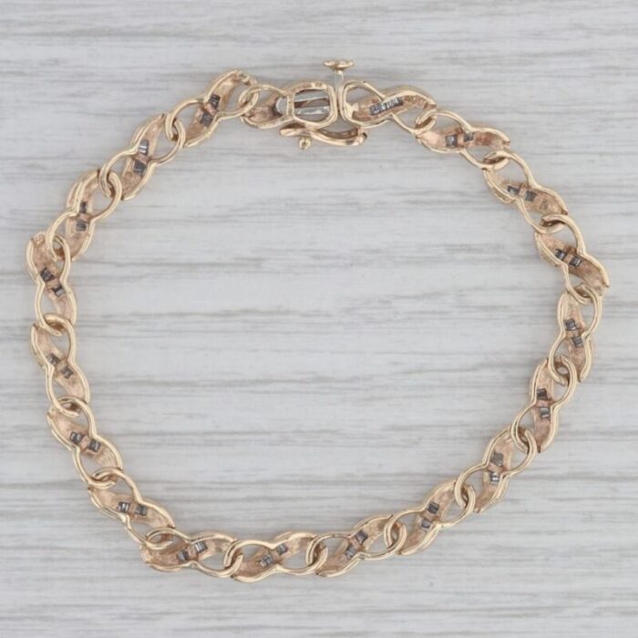 7 diamond scalloped linked bracelet 10k yellow gold 9674