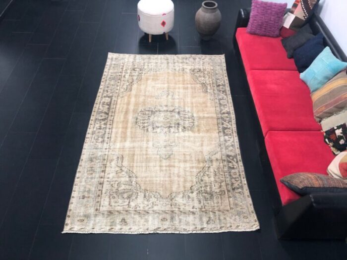 antique faded wool rug 1