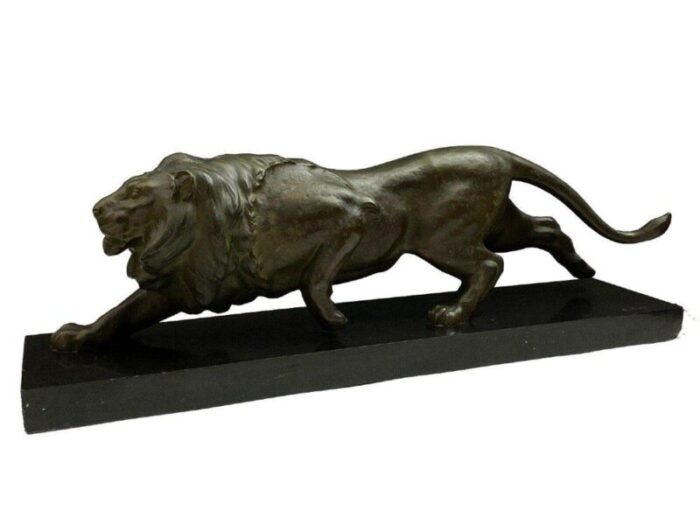 art deco bronze lion on black marble by e guy 1930 1