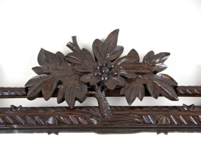 black forest wall mirror with center top carving austria 1890s 11