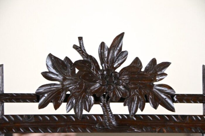 black forest wall mirror with center top carving austria 1890s 5