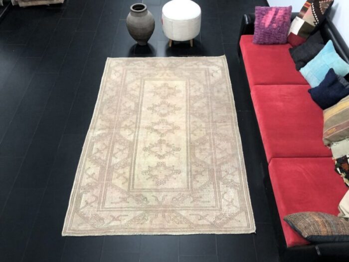 boho pastel tan faded rug 1