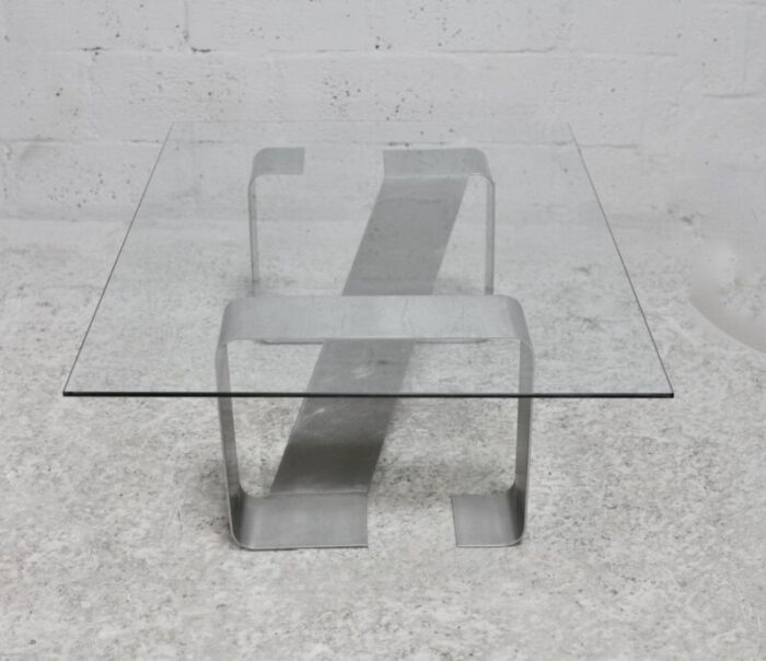 coffee table with kinetic steel base and glass slab 1970s 1816