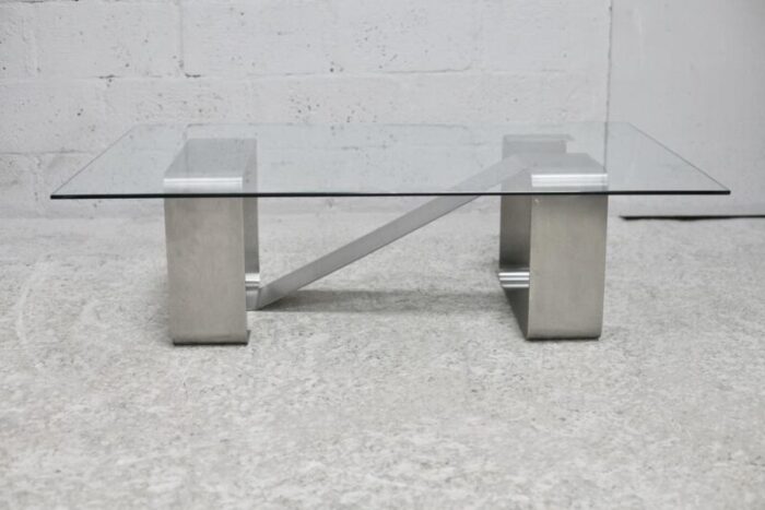 coffee table with kinetic steel base and glass slab 1970s 2231