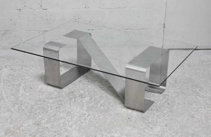 coffee table with kinetic steel base and glass slab 1970s 8986