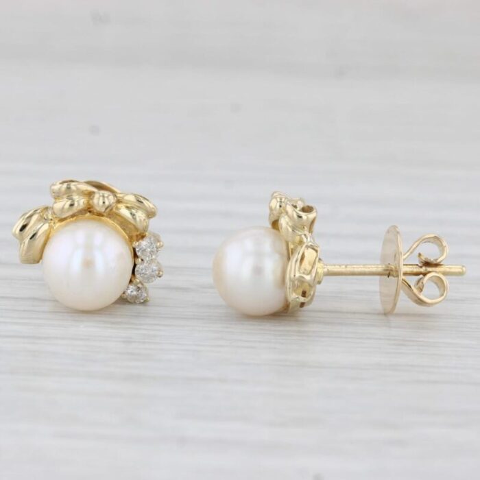 cultured pearl 020ctw diamond bow stud earrings 14k yellow gold 2 pieces 6095