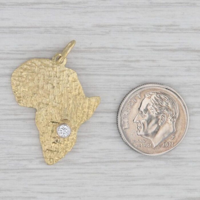 custom made 010ct diamond africa pendant hammered 18k yellow gold 3890