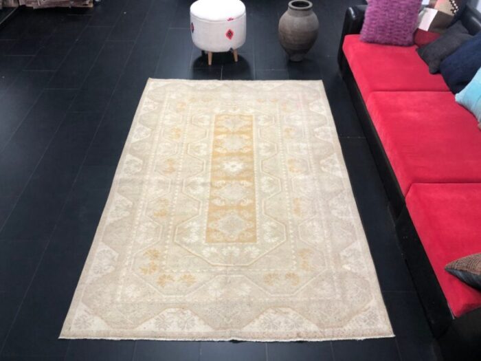 large vintage anatolian faded peach rug 1