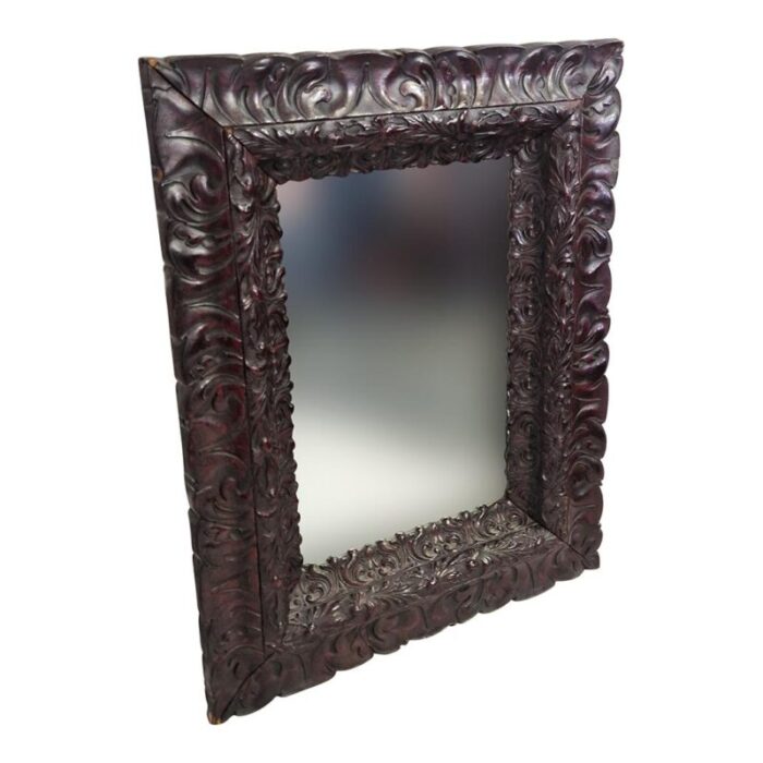 mirror with richly carved wooden frame 1600s 1666