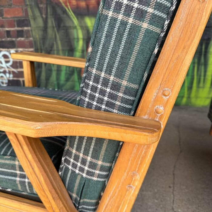 pair of ranch oak lounge chairs reupholstered in plaid from pindler 0185