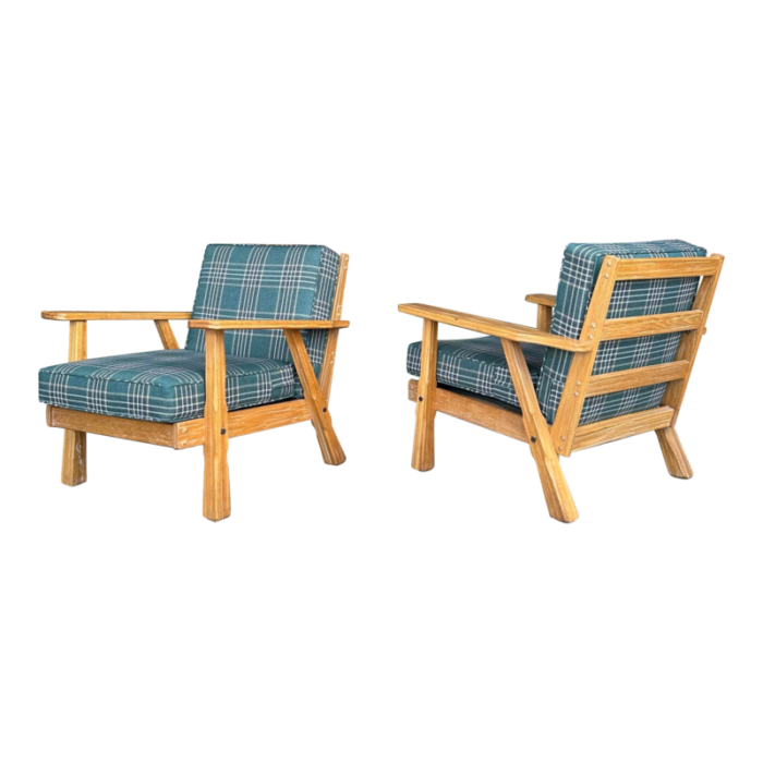 pair of ranch oak lounge chairs reupholstered in plaid from pindler 4378