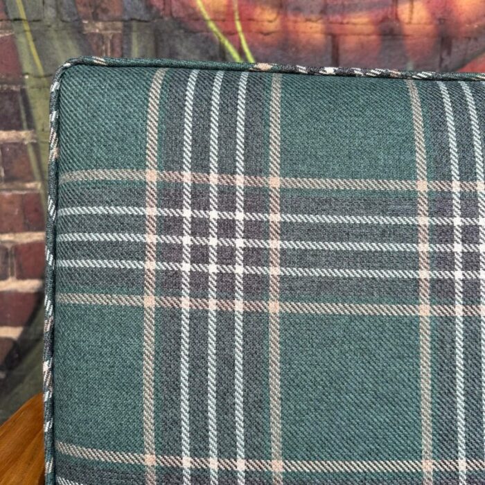 pair of ranch oak lounge chairs reupholstered in plaid from pindler 8142