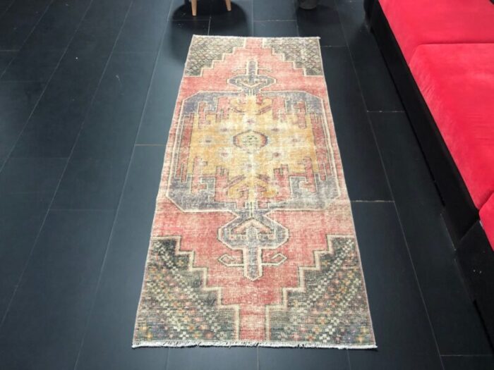 red faded oushak rug 1