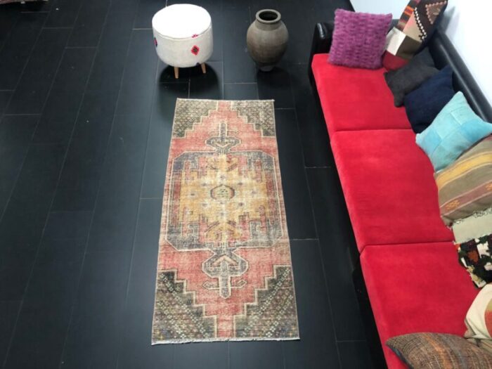 red faded oushak rug 2