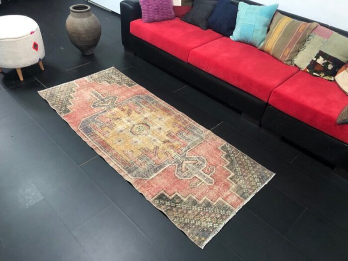 red faded oushak rug 4