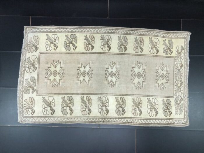 small antique wool tan color pastel rug 5