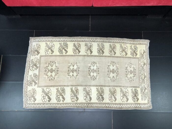 small antique wool tan color pastel rug 6