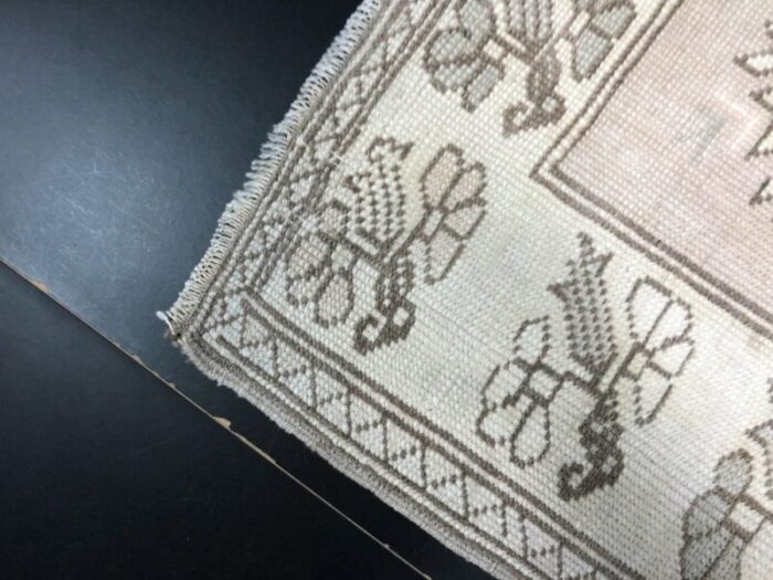 small antique wool tan color pastel rug 8