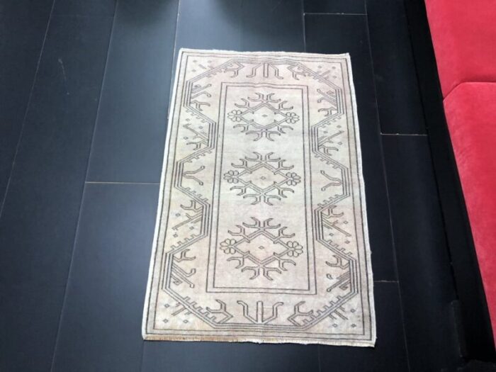 small vintage turkish neutral area rug 1