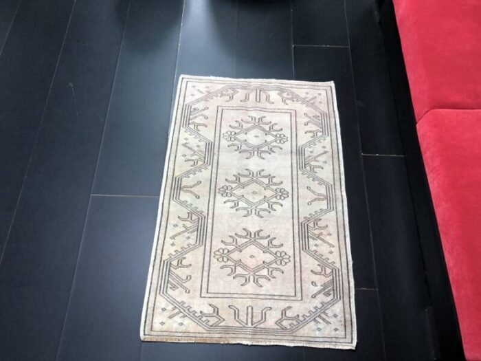 small vintage turkish neutral area rug 2