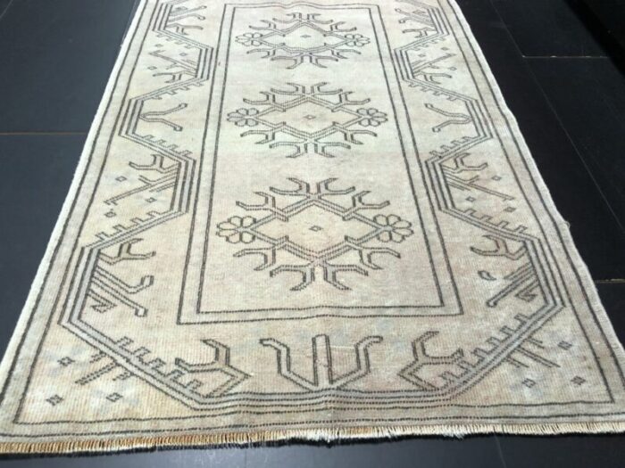 small vintage turkish neutral area rug 4