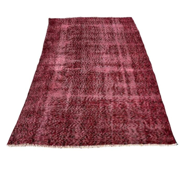 turkish over dyed red rug in wool 1