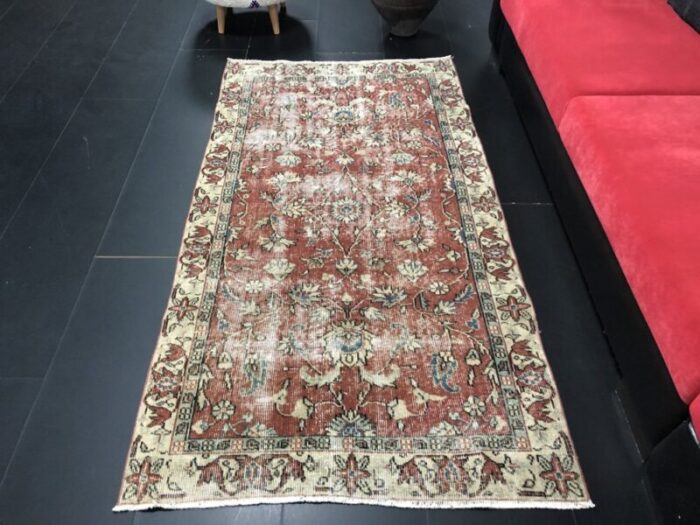 vintage faded oushak rug 1