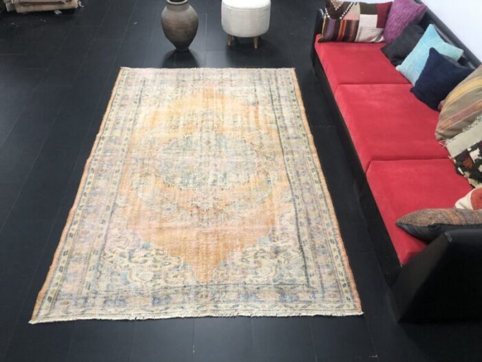 vintage orange faded oushak wool rug 2