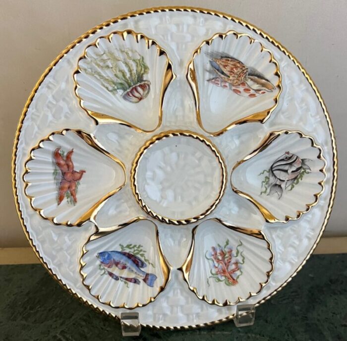 vintage oyster plate with sea creatures lined in gold 1614