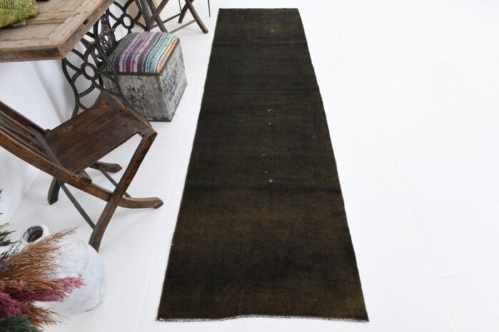 vintage runner rug in camouflage brown 1