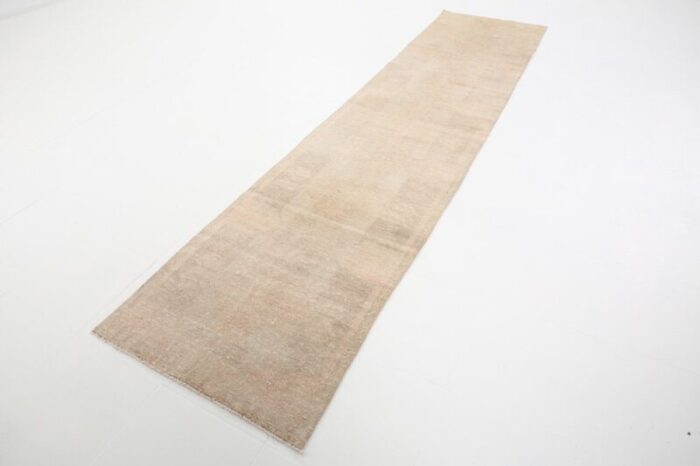 vintage runner rug in faded beige 1