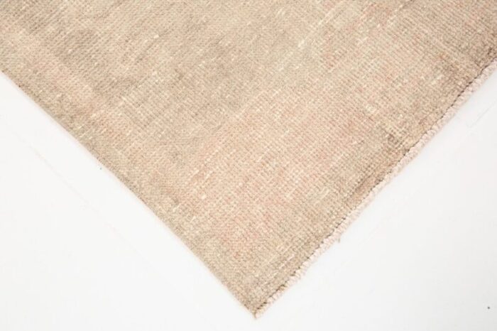 vintage runner rug in faded beige 11