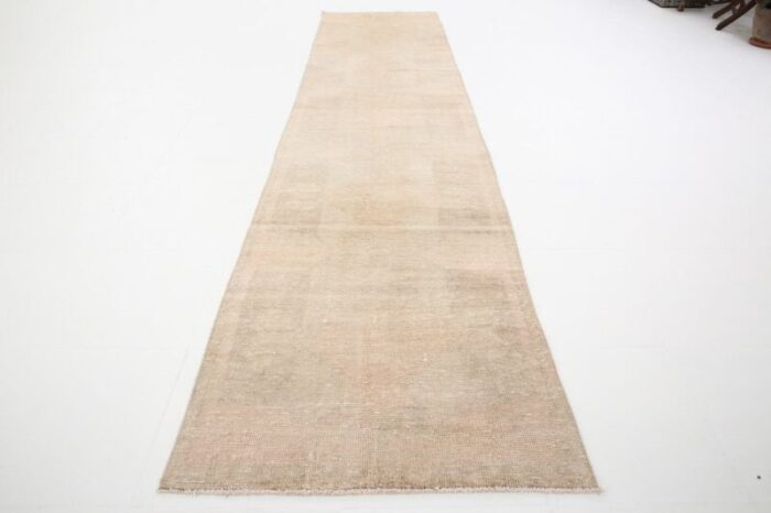 vintage runner rug in faded beige 5