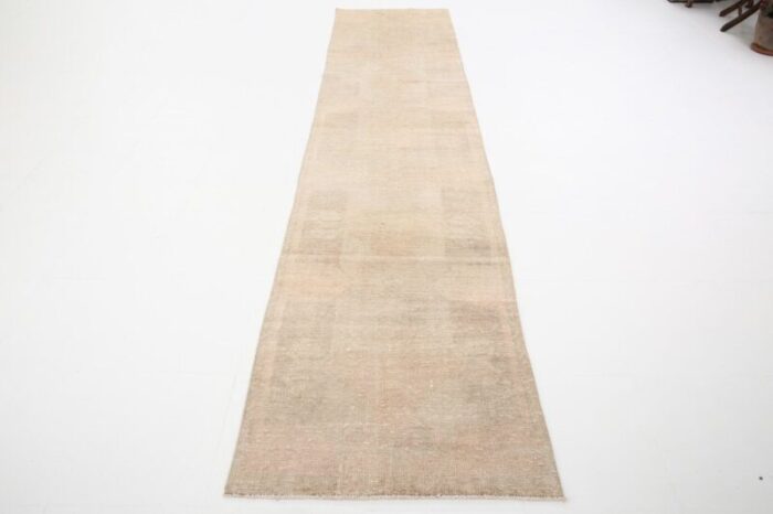 vintage runner rug in faded beige 6