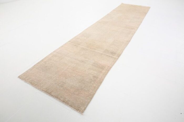 vintage runner rug in faded beige 7