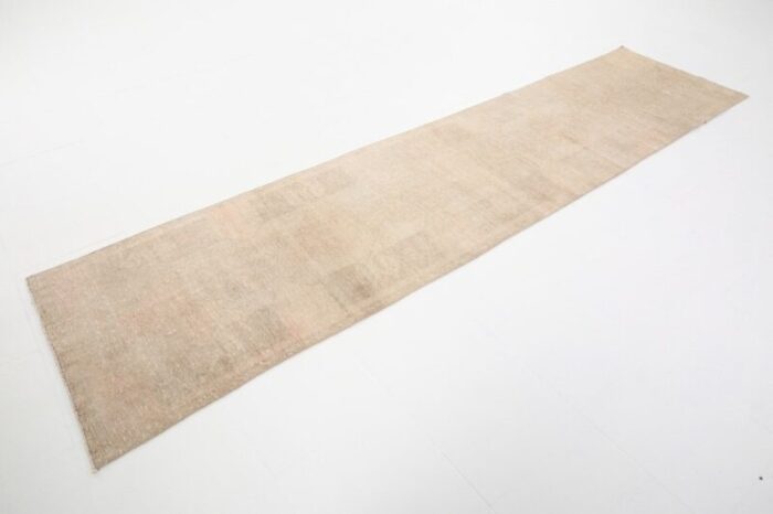 vintage runner rug in faded beige 8