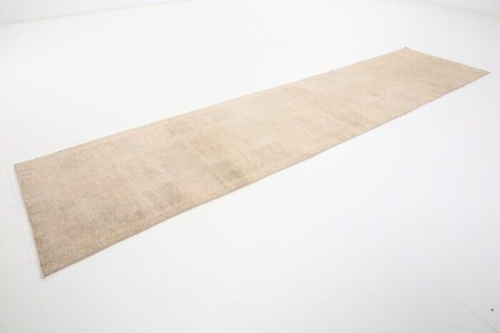 vintage runner rug in faded beige 9